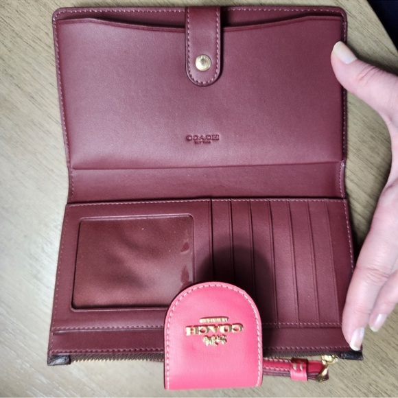 Coach Wallet Signature Color Block
Brown/Watermelon. Excellent condition. - Picture 4 of 5